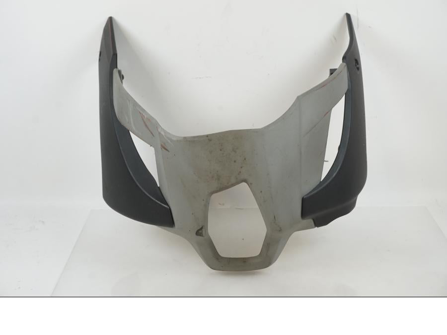 Vänster sida på Magkåpa från en Honda NC 750 S -2017 motorcykel.