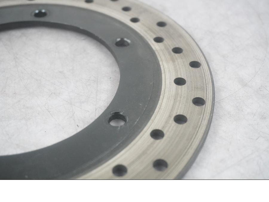 Vänster sida på Bromsskiva från en Yamaha YZF 1000 R1 -2003 motorcykel.