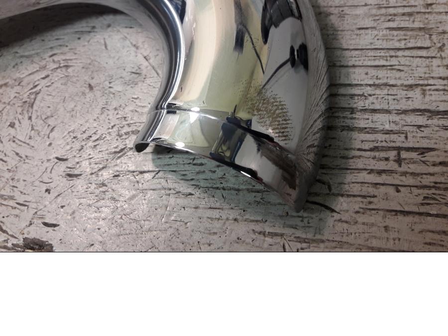 Baksidan på Värmeskydd från en H-D Street Glide FLHX -2009 motorcykel.