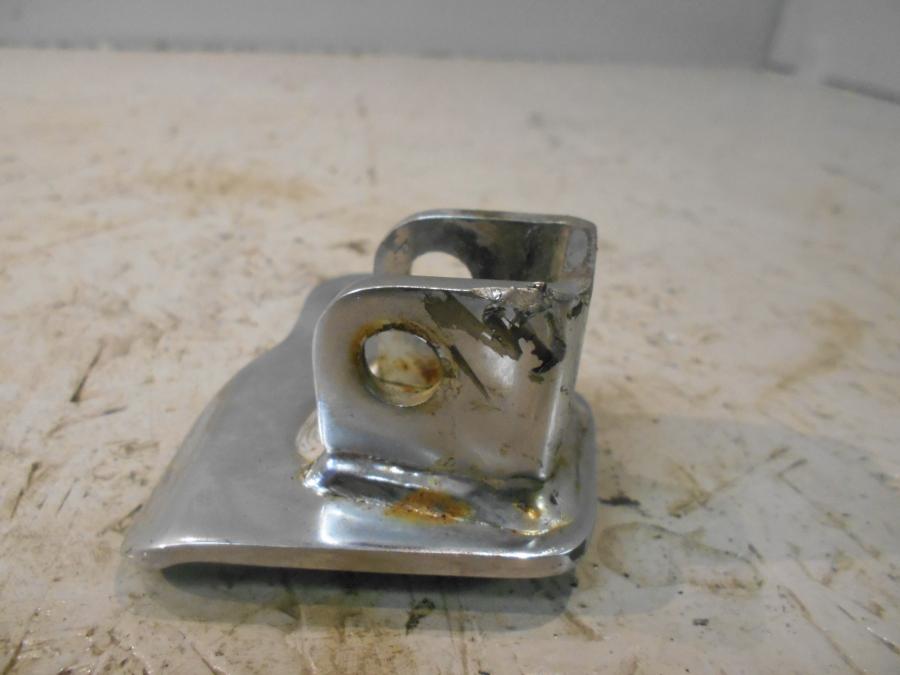 Baksidan på Fotpinnefäste från en Triumph Speedmaster -2010 motorcykel.