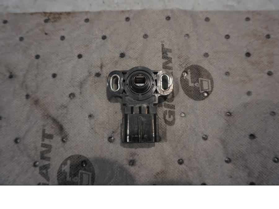 Baksidan på TPS från en Yamaha XT 1200 Z -2011 motorcykel.