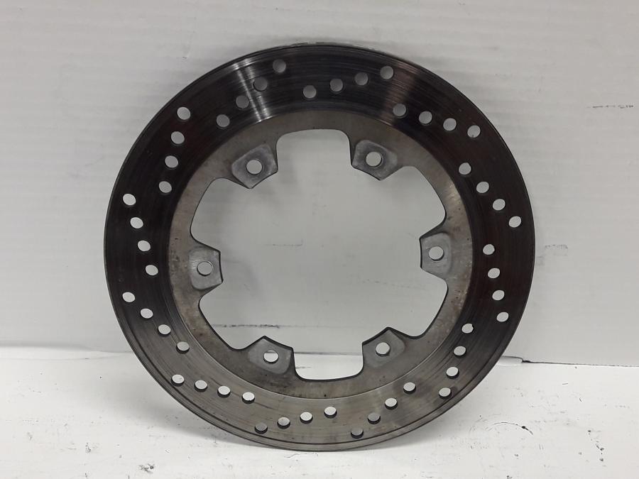 Baksidan på Bromsskiva från en Ducati 750 SS -2000 motorcykel.
