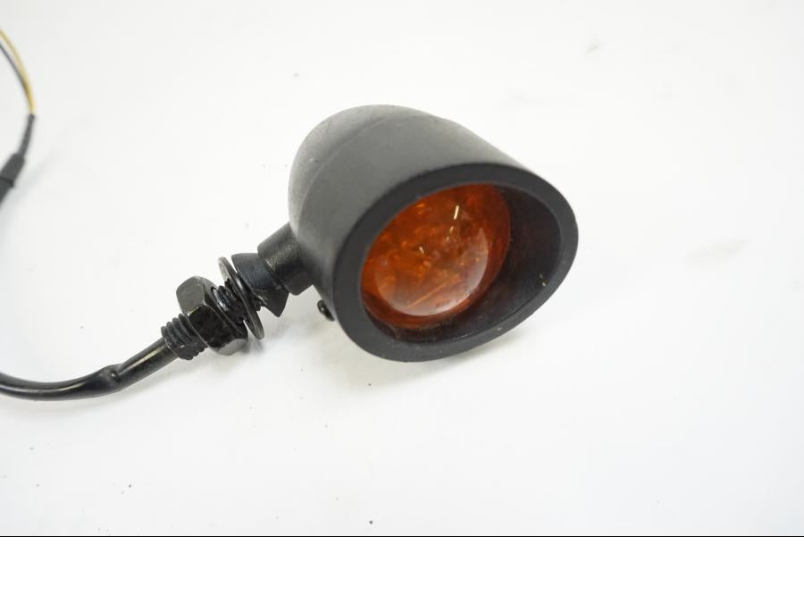 Baksidan på Blinkers från en Yamaha XVS 1100 -2004 motorcykel.