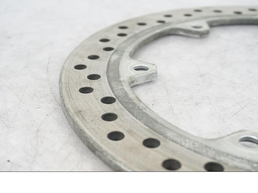 Vänster sida på Bromsskiva från en Honda CTX 1300 -2014 motorcykel.