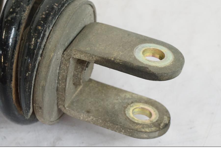 Vänster sida på Stötdämpare från en Suzuki VL 800 -2002 motorcykel.