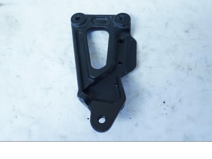 Baksidan på Fotpinnefäste från en Ducati 750 SS -1995 motorcykel.