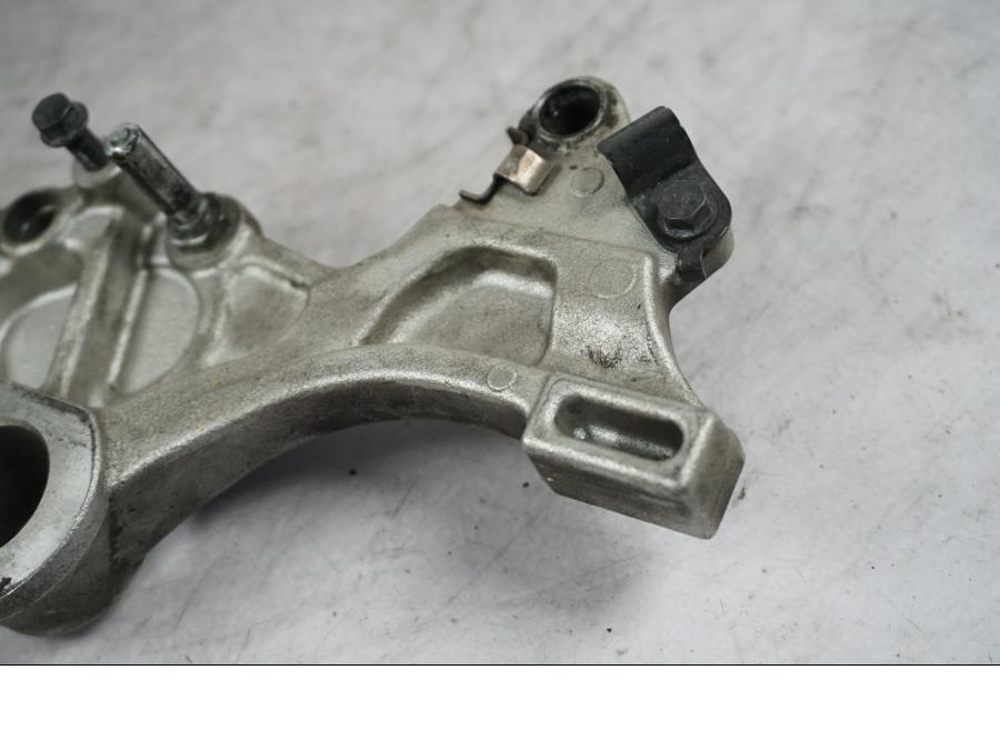 Snett uppifrån på Bromsoksfäste från en Honda CBR 1000 RR -2009 motorcykel.