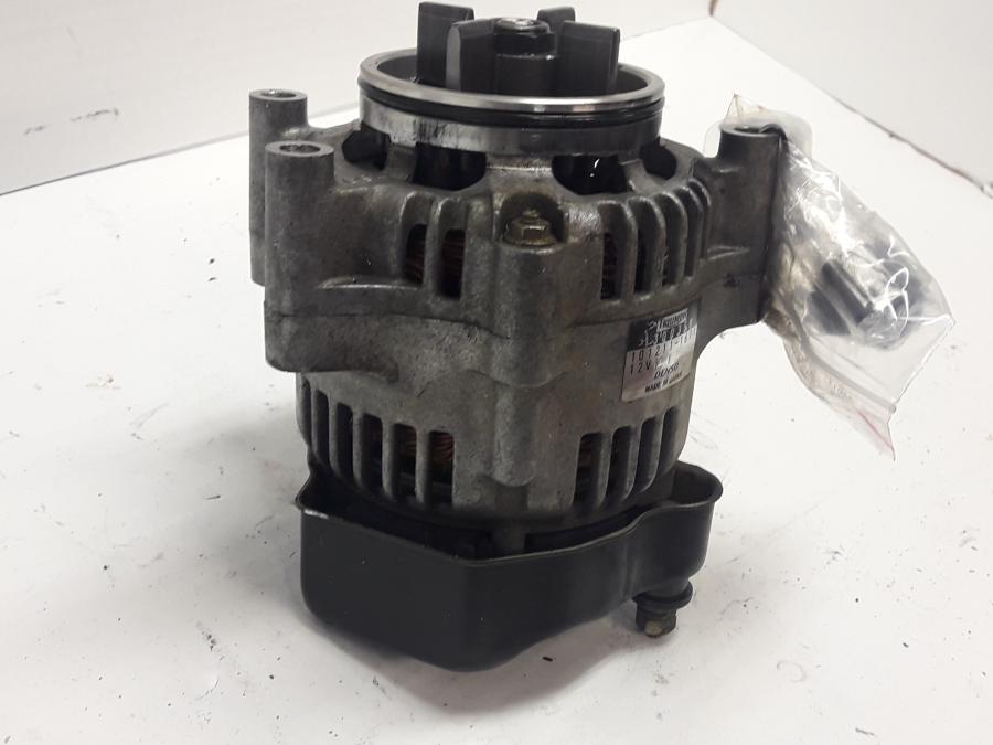 Höger sida på Generator från en Triumph Tiger -1999 motorcykel.