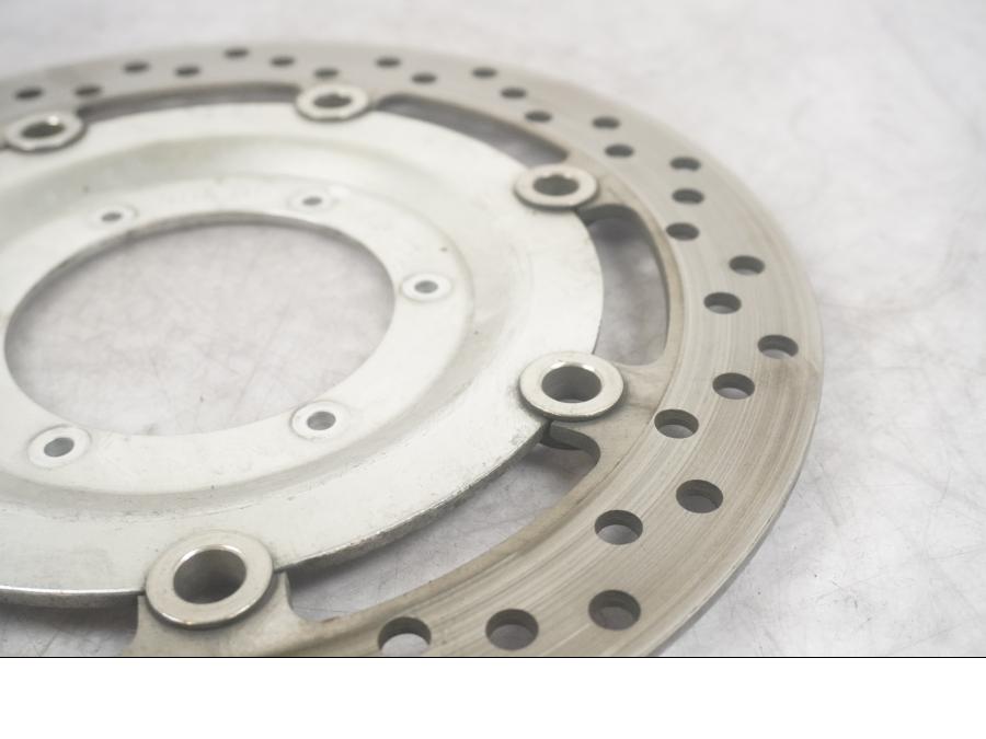 Vänster sida på Bromsskiva från en Honda VTX 1800 -2002 motorcykel.