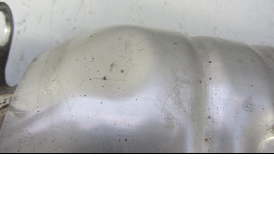 Snett nerifrån på Mellanburk från en Triumph Thunderbird 1600 -2011 motorcykel.