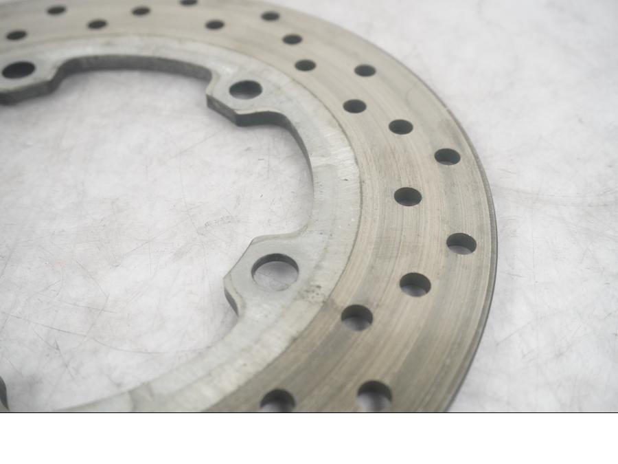 Vänster sida på Bromsskiva från en Yamaha YZF 1000 R1 -2010 motorcykel.