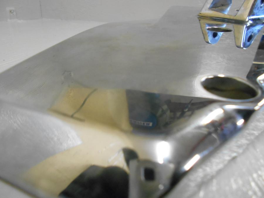 Baksidan på Fotpinnefäste från en BMW K 1200 LT -2007 motorcykel.