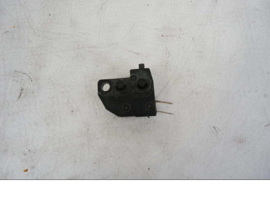 Baksidan på Bromsljuskontakt från en Kawasaki ER-6N -2012 motorcykel.