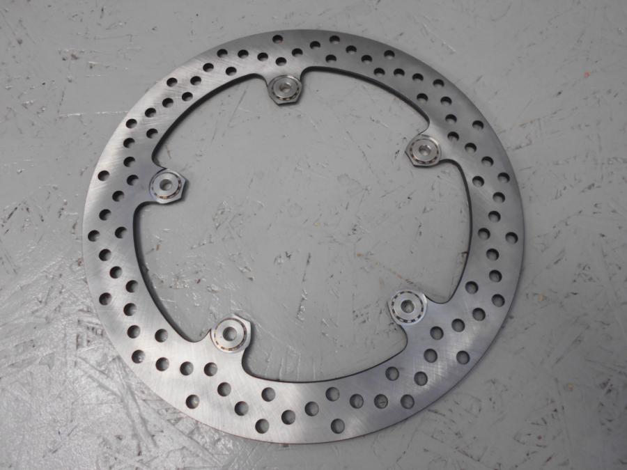 Baksidan på <p>fram, Brembo 320 x 4,45mm, nyckick. okänd modell</p>
<p>Bultcirkel 205mm</p> motorcykel.