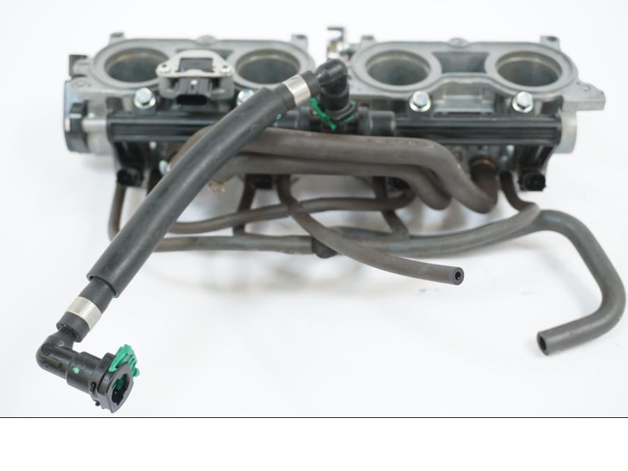 Snett nerifrån på Spjällhus från en Honda CB 650 R -2019 motorcykel.