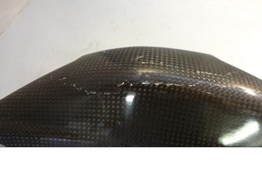 Baksidan på Värmeskydd från en Ducati Hypermotard -2014 motorcykel.