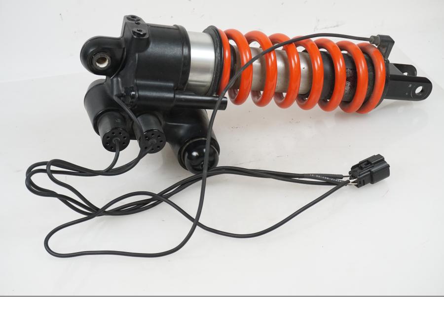 Vänster sida på Stötdämpare från en H-D Adventure Pan America Special RA1250S -2021 motorcykel.