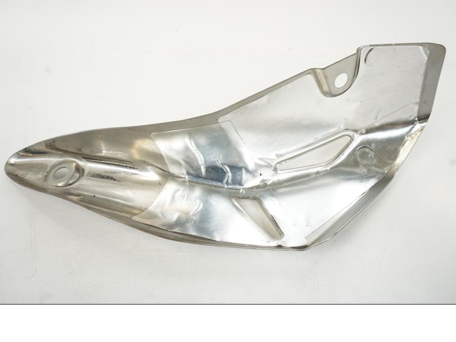 Vänster sida på Värmeskydd från en Kawasaki Z 900 -2017 motorcykel.