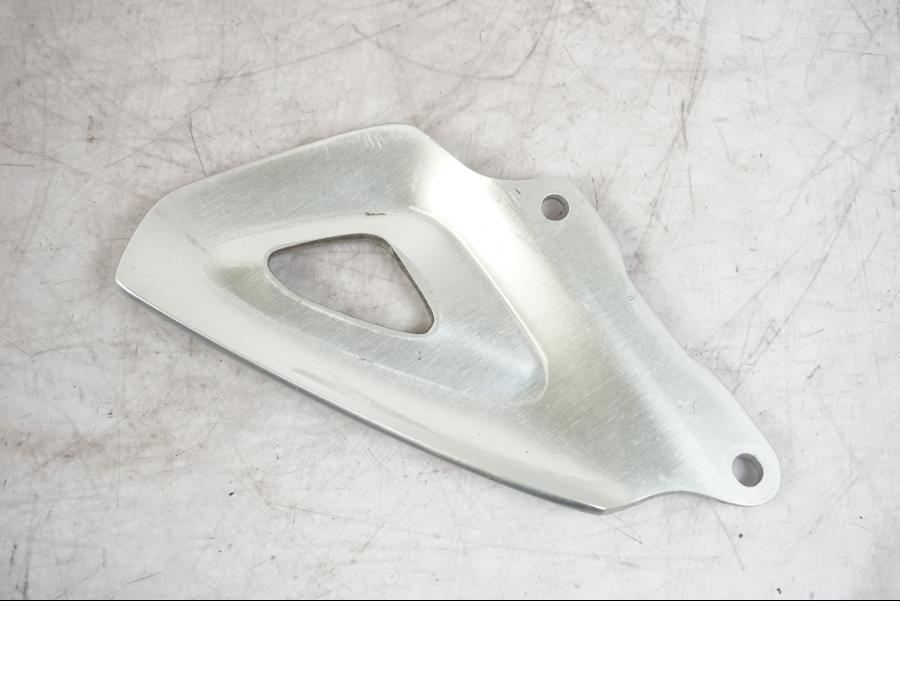 Vänster sida på Hälskydd från en Triumph Tiger -2009 motorcykel.