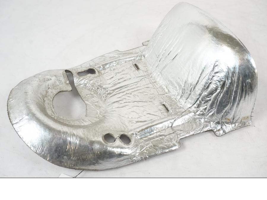 Vänster sida på Värmeskydd från en Suzuki SV 650 S -2005 motorcykel.