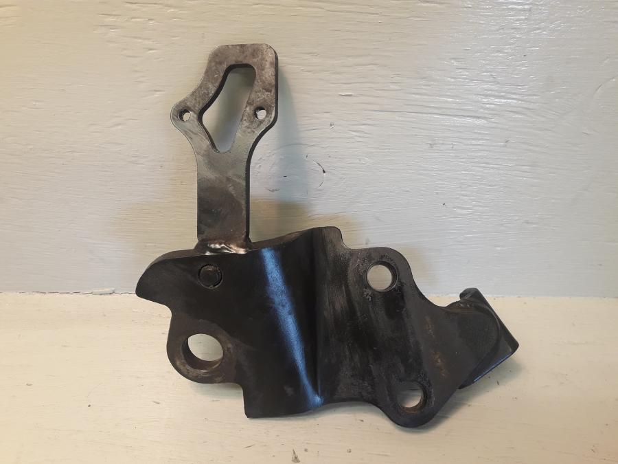 Baksidan på Fotpinnefäste från en Yamaha WR 125 -2010 motorcykel.