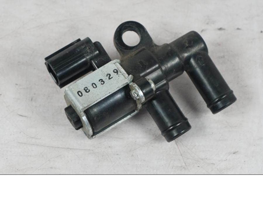 Vänster sida på Second Air från en KTM 690 SM R -2009 motorcykel.