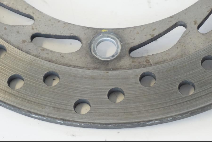 Höger sida på Bromsskiva från en Honda SH 300 A -2011 scooter.