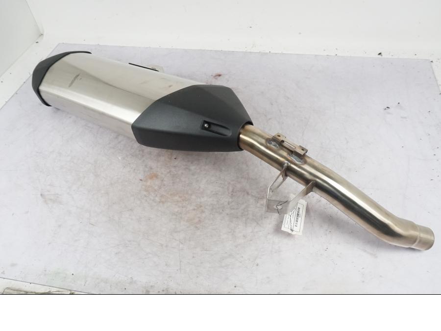 Vänster sida på Ljuddämpare från en Triumph Tiger -2012 motorcykel.