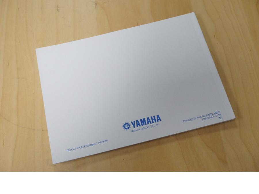 Baksidan på Instruktionsbok från en Yamaha XVS 1100 -2006 motorcykel.