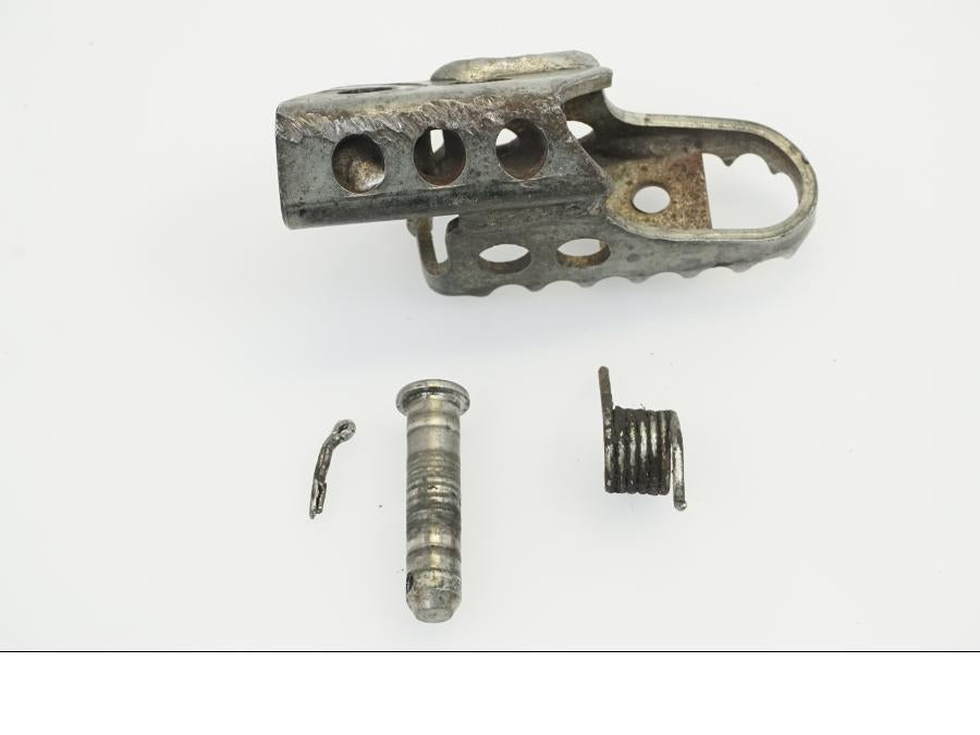 Höger sida på Fotpinne från en Yamaha WR 125 -2010 motorcykel.