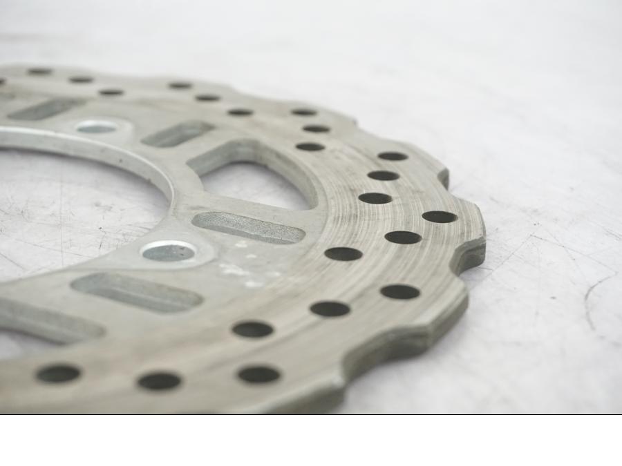 Vänster sida på Bromsskiva från en Kawasaki Z 1000 -2011 motorcykel.