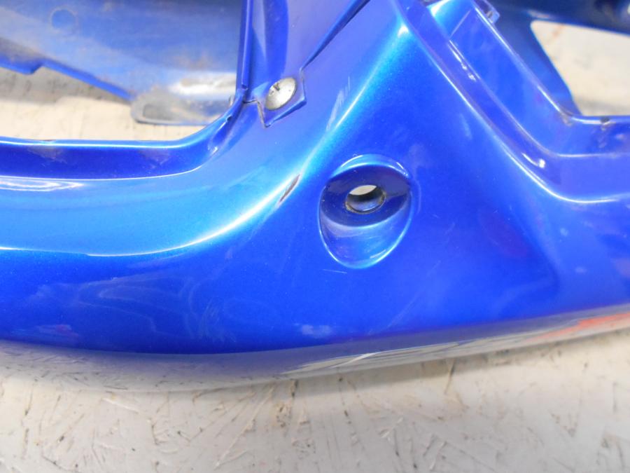 Snett uppifrån på Bakvinge från en Honda CBR 125 R -2006 motorcykel.