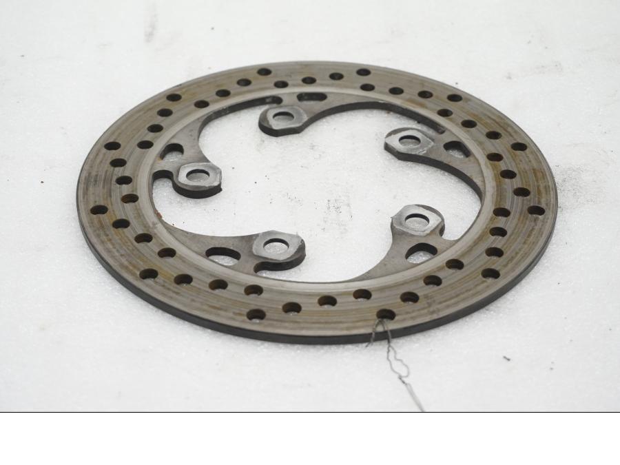 Baksidan på Bromsskiva från en Suzuki SV 1000 -2007 motorcykel.