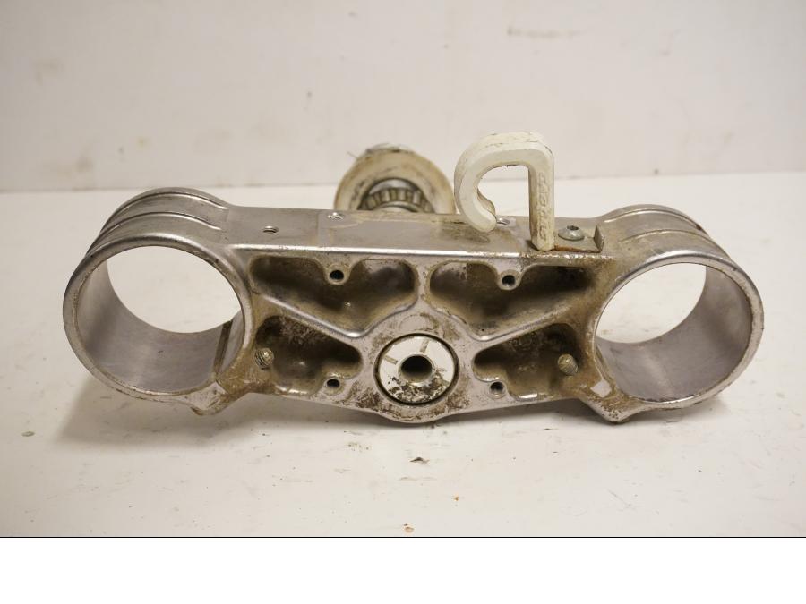 Baksidan på Gaffelkrona från en Gasgas CG 250 -2013 motorcykel.