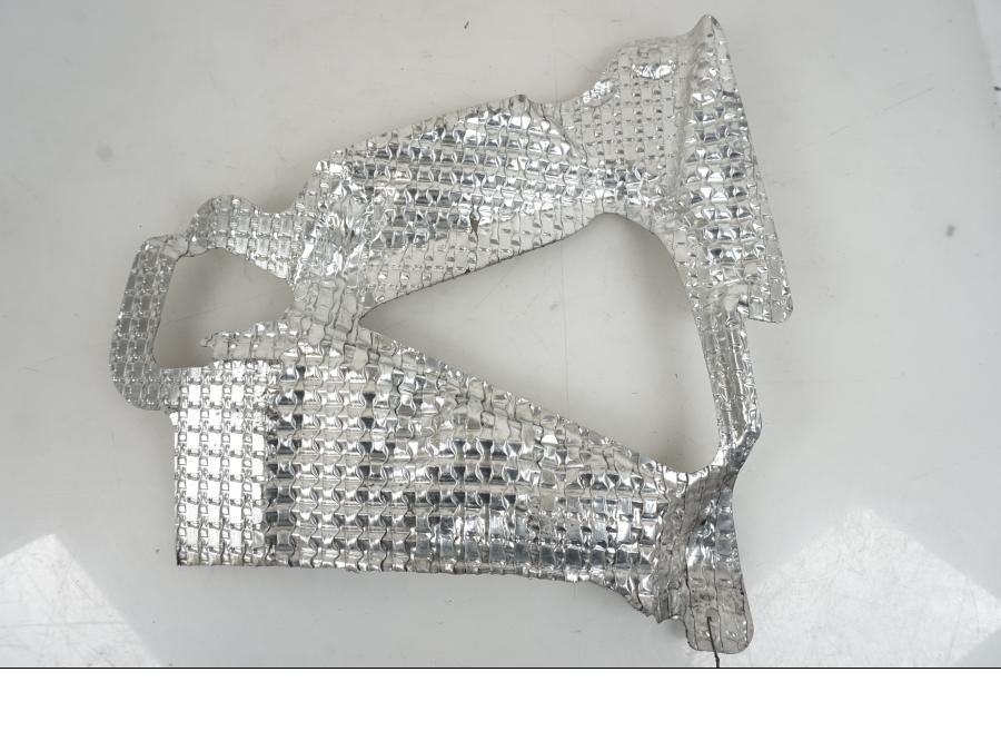 Baksidan på Värmeskydd från en Suzuki GSX-R 1000 -2007 motorcykel.