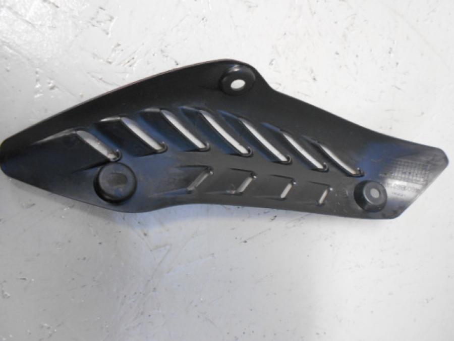 Baksidan på Värmeskydd från en Ducati Monster 1200 -2014 motorcykel.