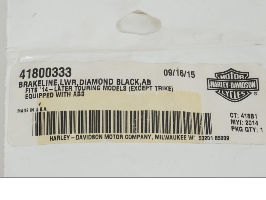 Baksidan på Bromsslang från en H-D Harley diverse -2014 motorcykel.