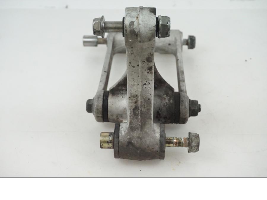 Vänster sida på Stötdämparlänkage från en Honda CBR 1000 -2005 motorcykel.