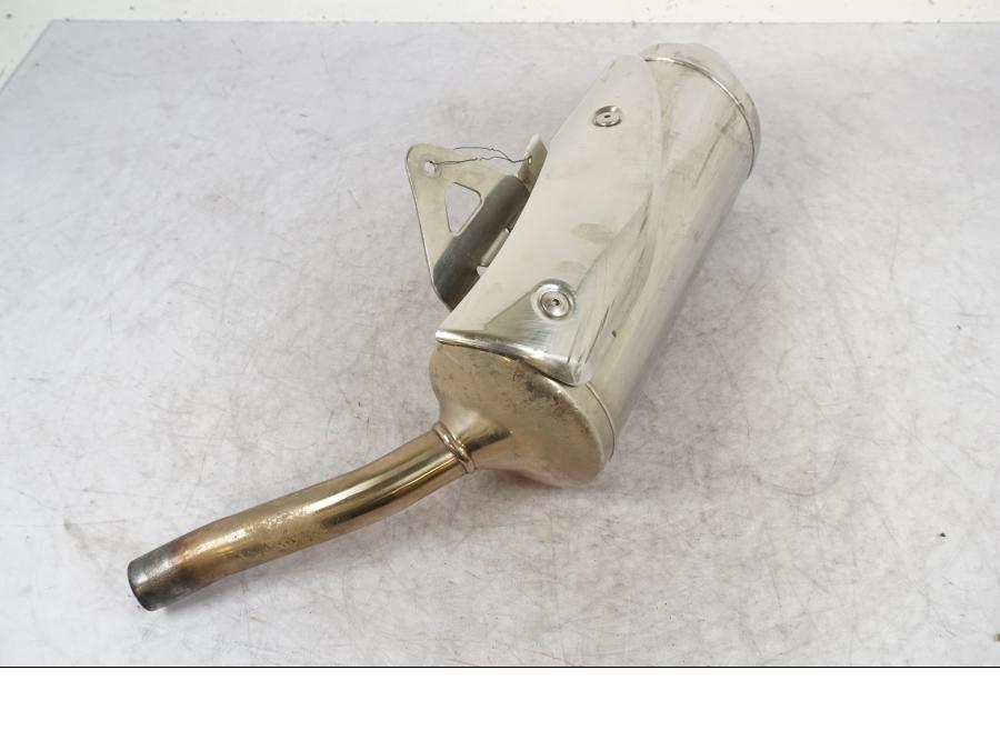 Vänster sida på Ljuddämpare från en Triumph Street Triple -2009 motorcykel.