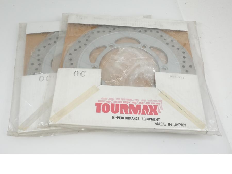 Snett nerifrån på Bromsskiva från en Honda ST 1100 -2001 motorcykel.