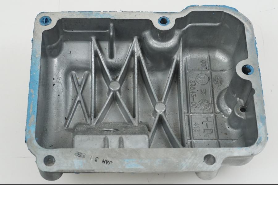 Snett uppifrån på Transmissionskåpa från en H-D Softail -2002 motorcykel.