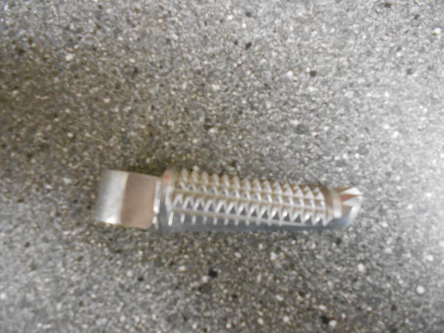 Baksidan på Fotpinne från en Yamaha YZF R6 -1999 motorcykel.