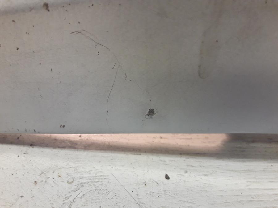 Vänster sida på Sving från en Aprilia RS 125 -2017 motorcykel.