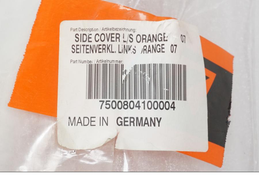 Vänster sida på Sidkåpa från en KTM 690 SM -2008 motorcykel.