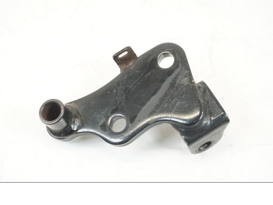 Vänster sida på Fotpinnefäste från en Yamaha WR 125 -2011 motorcykel.