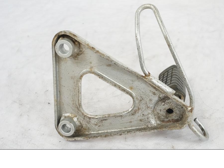 Vänster sida på Fotpinne från en Kawasaki KL 650A -1987 motorcykel.