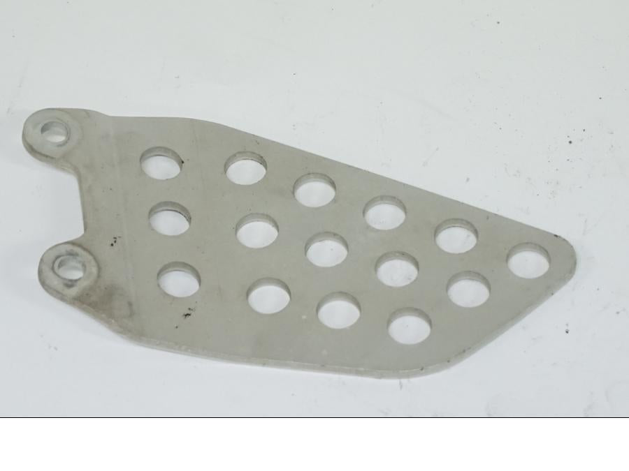 Vänster sida på Fotpinnehälskydd från en Honda CBR 900 RR -2002 motorcykel.