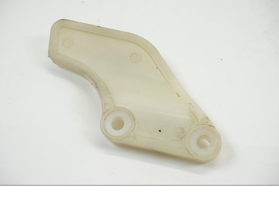 Vänster sida på Kedjeskydd från en Honda XRV 750 -2001 motorcykel.