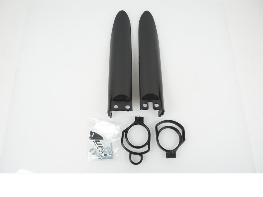 Baksidan på Gaffelbensskydd från en Kawasaki KX 85 -2013 motorcykel.