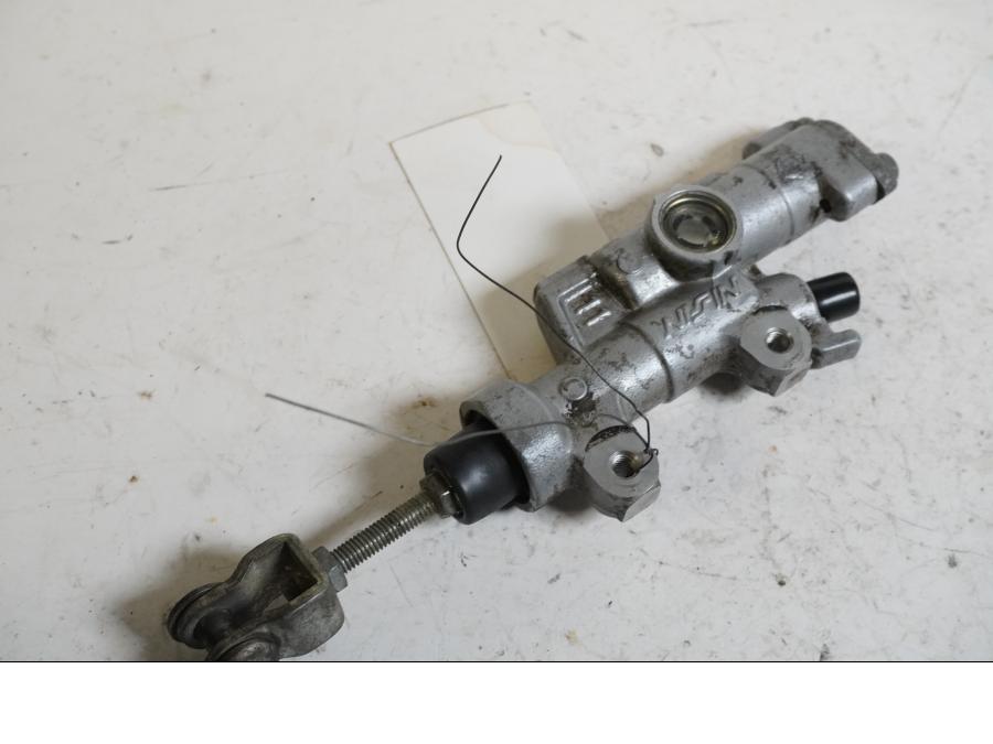 Baksidan på Bromshuvudcylinder från en Gasgas CG 250 -2013 motorcykel.